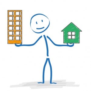 Stickman with with house and apartmenthouse on the white. Eps 10 vector file.